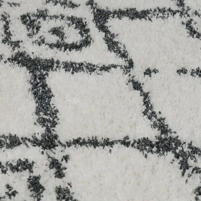 שטיח קזבלנקה 09 לבן/שחור עם פרנזים | השטיח האדום