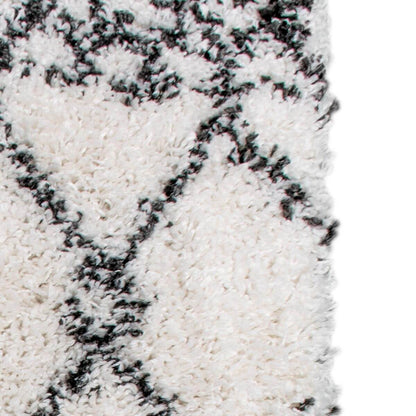 שטיח קזבלנקה 01 לבן/שחור עם פרנזים | השטיח האדום