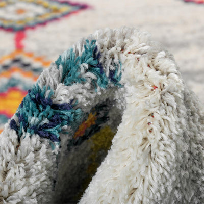 שטיח מיקונוס 01 קרם/אפור עם פרנזים | השטיח האדום