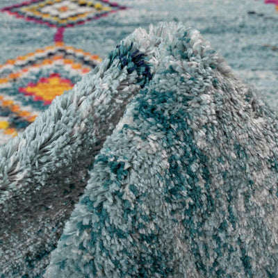 שטיח מיקונוס 01 טורקיז עם פרנזים | השטיח האדום