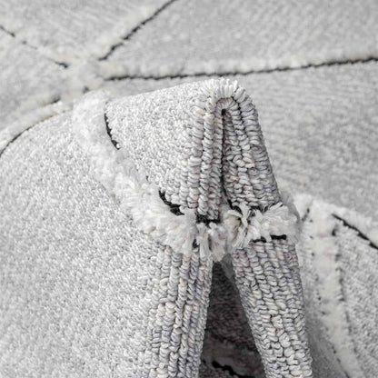 שטיח אטלס 24 אפור/קרם עם פרנזים | השטיח האדום