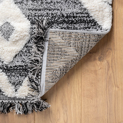 שטיח אטלס 07 אפור עם פרנזים שחורים | השטיח האדום